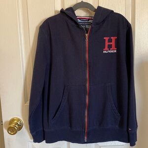 Boys, navy blue Tommy Hilfiger zip up hoodie. Size M 12-14.